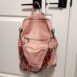 Chic Pink Backpack with Colorful Strap